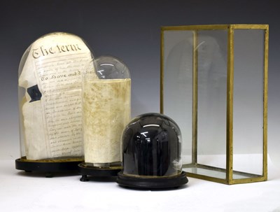 Lot 322 - Three late 19th century glass domes raised on ebonised stands, etc