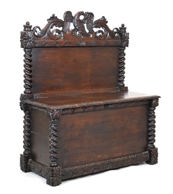 Lot 563 - Early 20th Century carved oak box settle