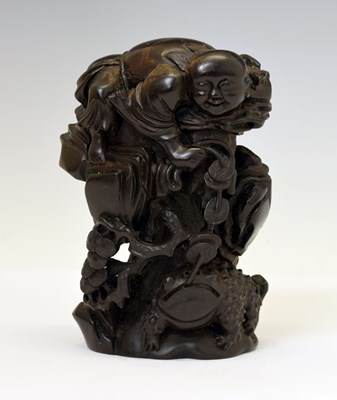 Lot 637 - Chinese carved hardwood figure of Liu Haichan with a toad