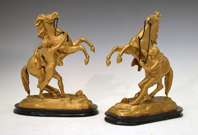 Lot 609 - Pair of gilt spelter Marly Horses on ebonised bases
