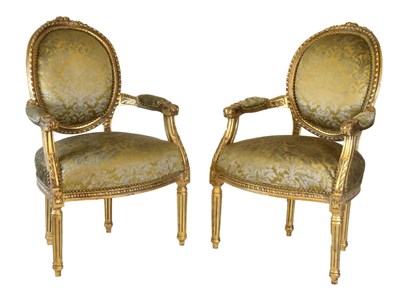 Lot 588 - Pair of French style open armchairs
