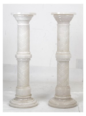 Lot 586 - Pair of alabaster pedestals