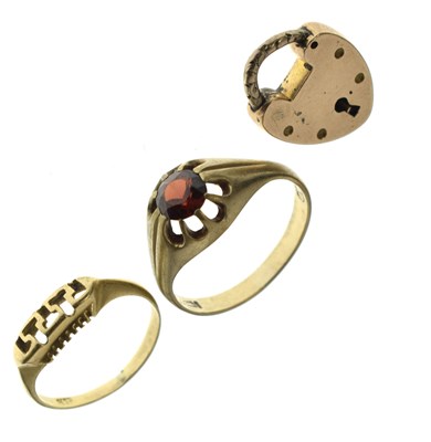 Lot 74 - 9ct gold red paste ring, together with a yellow metal ring and a padlock clasp (3)