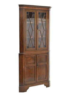 Lot 563 - 19th century inlaid oak floor-standing corner cabinet