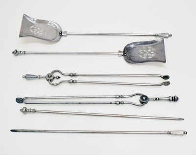 Lot 375 - Two sets of steel fire irons