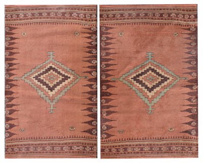 Lot 576 - Two machine made Eastern style rugs