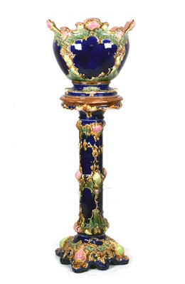 Lot 678 - Majolica jardiniere or planter and stand