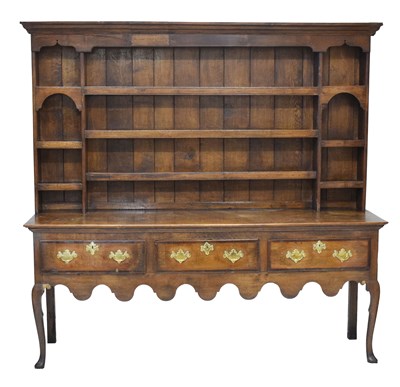 Lot 534 - George III oak dresser and rack