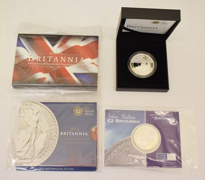 Lot 238 - Elizabeth II - Royal Mint - Four one-ounce silver proof Britannia coins, 2000, 2011, and 2012 x 2