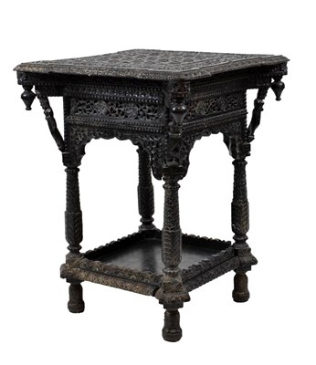 Lot 384 - Indian carved ebony occasional table
