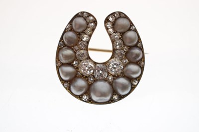 Lot 31 - Late Victorian diamond and pearl horseshoe brooch