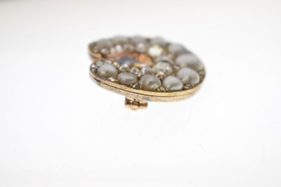Lot 31 - Late Victorian diamond and pearl horseshoe brooch