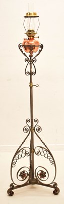 Lot 295 - Arts & Crafts wrought metal, copper and brass adjustable standard lamp