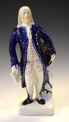 Lot 357 - Staffordshire pottery figure of Benjamin Franklin