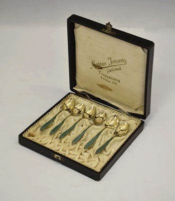 Lot 186 - David Andersen - Set of six white-metal and guilloche demi-tasse coffee spoons