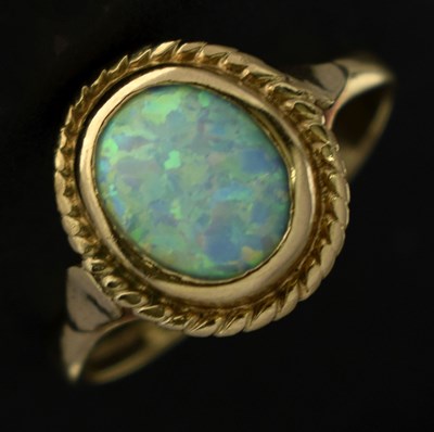 Lot 20 - 9ct gold half eternity ring set seven cubic zirconias and an opal 9ct gold ring (a/f)
