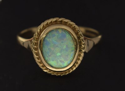 Lot 20 - 9ct gold half eternity ring set seven cubic zirconias and an opal 9ct gold ring (a/f)