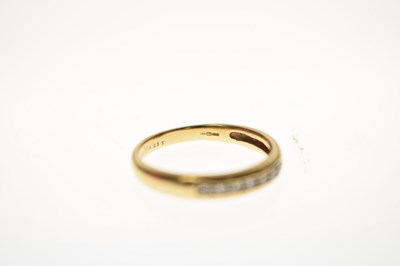 Lot 16 - 18ct gold diamond half eternity ring