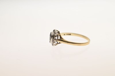 Lot 19 - Modern 9ct gold and sapphire cluster ring