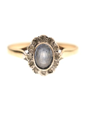 Lot 19 - Modern 9ct gold and sapphire cluster ring