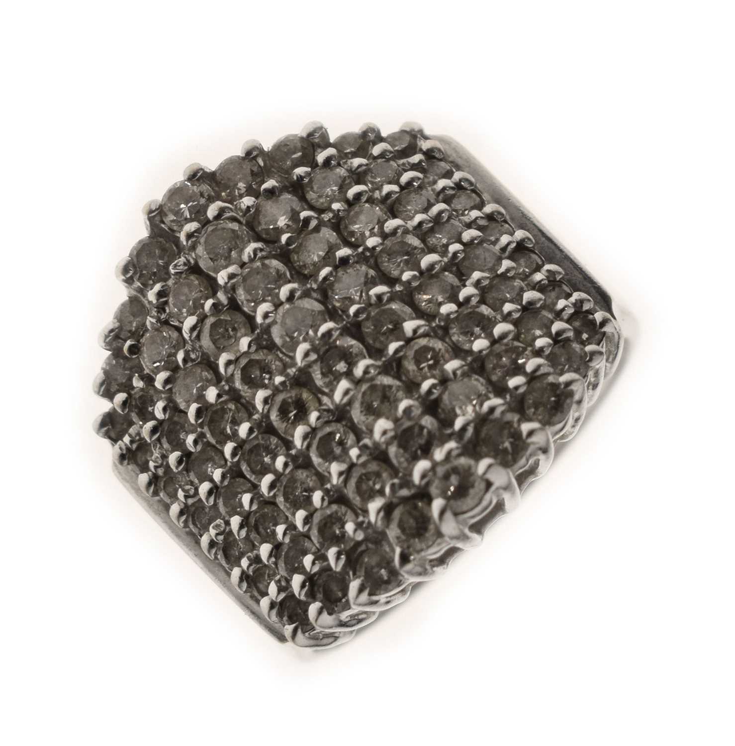 Lot 18 - Multi stone diamond white metal dress ring