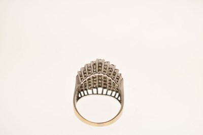 Lot 18 - Multi stone diamond white metal dress ring