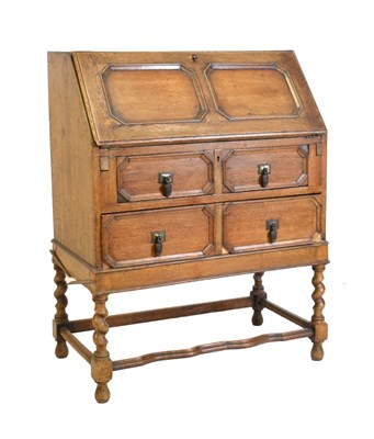 Lot 527 - Early 20th Century oak Bureau