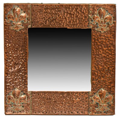 Lot 292 - Arts & Crafts planished copper wall mirror