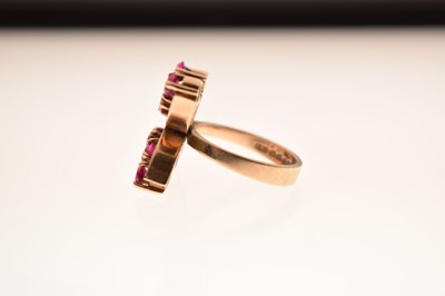Lot 23 - 9ct gold ring set ten rubies in double 'C' formation