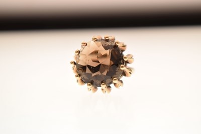 Lot 48 - Modernist 9ct gold dress ring set a large brown stone