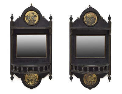 Lot 480 - Pair of late Victorian Aesthetic movement ebonised and parcel gilt mirror back wall brackets