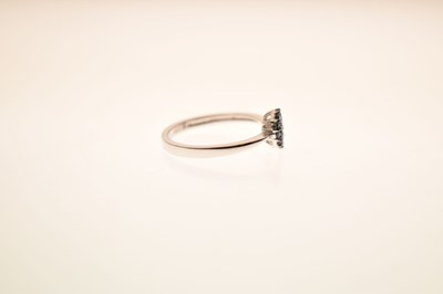 Lot 9 - Blue diamond 9ct white gold cluster ring