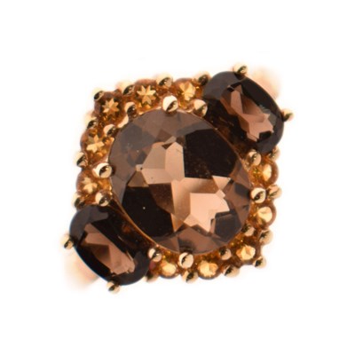 Lot 45 - Smoky quartz and citrine 9ct gold ring