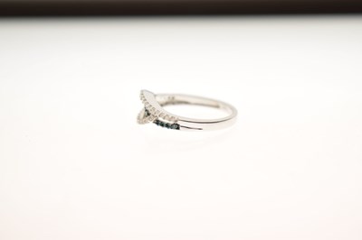 Lot 8 - White and blue diamond 9ct white gold half eternity ring