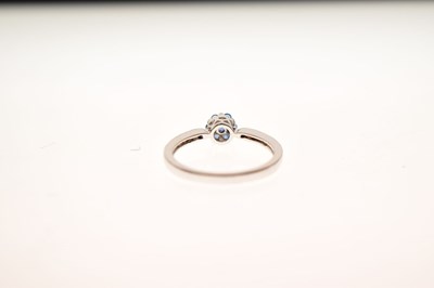 Lot 29 - White and blue diamond 9ct gold cluster ring