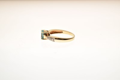 Lot 37 - Blue topaz and white stone 9ct gold ring