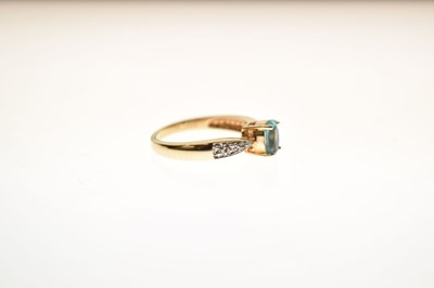 Lot 37 - Blue topaz and white stone 9ct gold ring