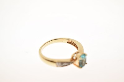 Lot 37 - Blue topaz and white stone 9ct gold ring
