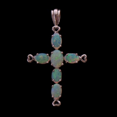 Lot 87 - Opal and 9ct white gold cross pendant