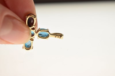 Lot 89 - 'London' blue topaz 9ct gold cross pendant