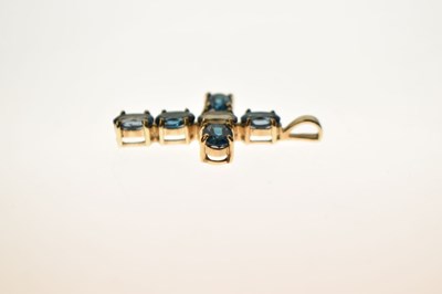 Lot 89 - 'London' blue topaz 9ct gold cross pendant