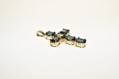 Lot 89 - 'London' blue topaz 9ct gold cross pendant