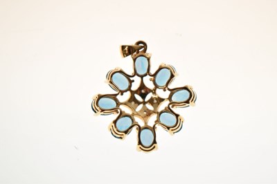 Lot 90 - 'London' blue topaz and diamond starburst 9ct gold pendant