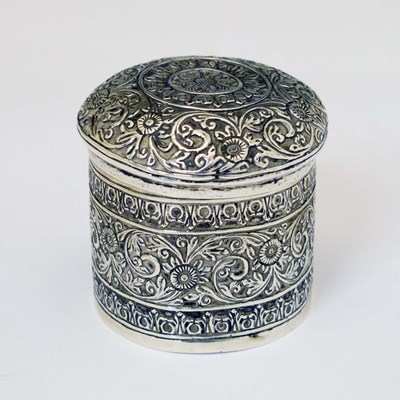 Lot 190 - 20th century Indian white-metal pot with kutch style decoration