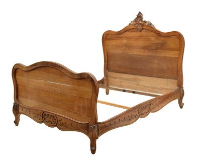 Lot 769 - Modern French style fruitwood king size bed