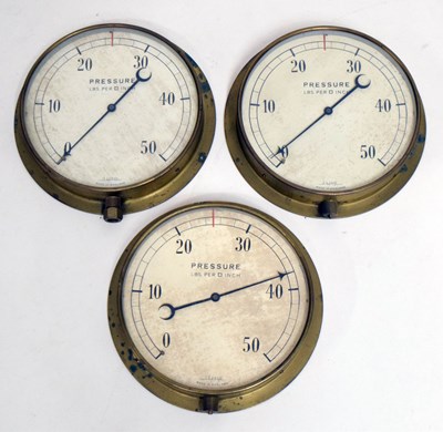 Lot 279 - Set of three numbered brass framed pressure gauges