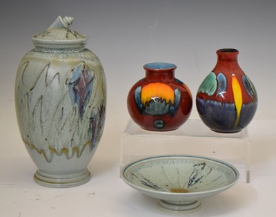 Lot 496 - Poole pottery - Urn, dish, and two small vases