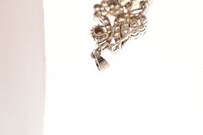 Lot 21 - Diamond white metal pendant