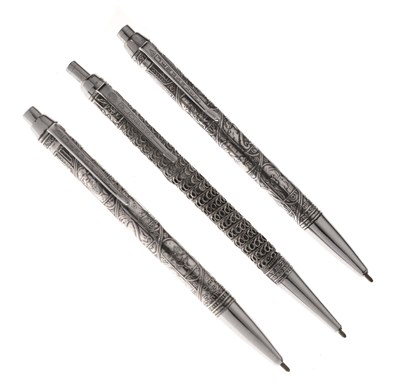 Lot 234 - Three Israeli white-metal retractable ballpoint pens