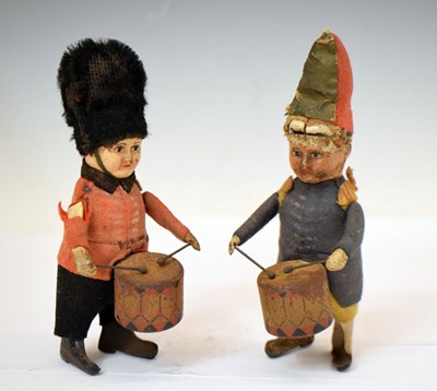 Lot 358 - Schuco - Two early 20th century clockwork tinplate drummers